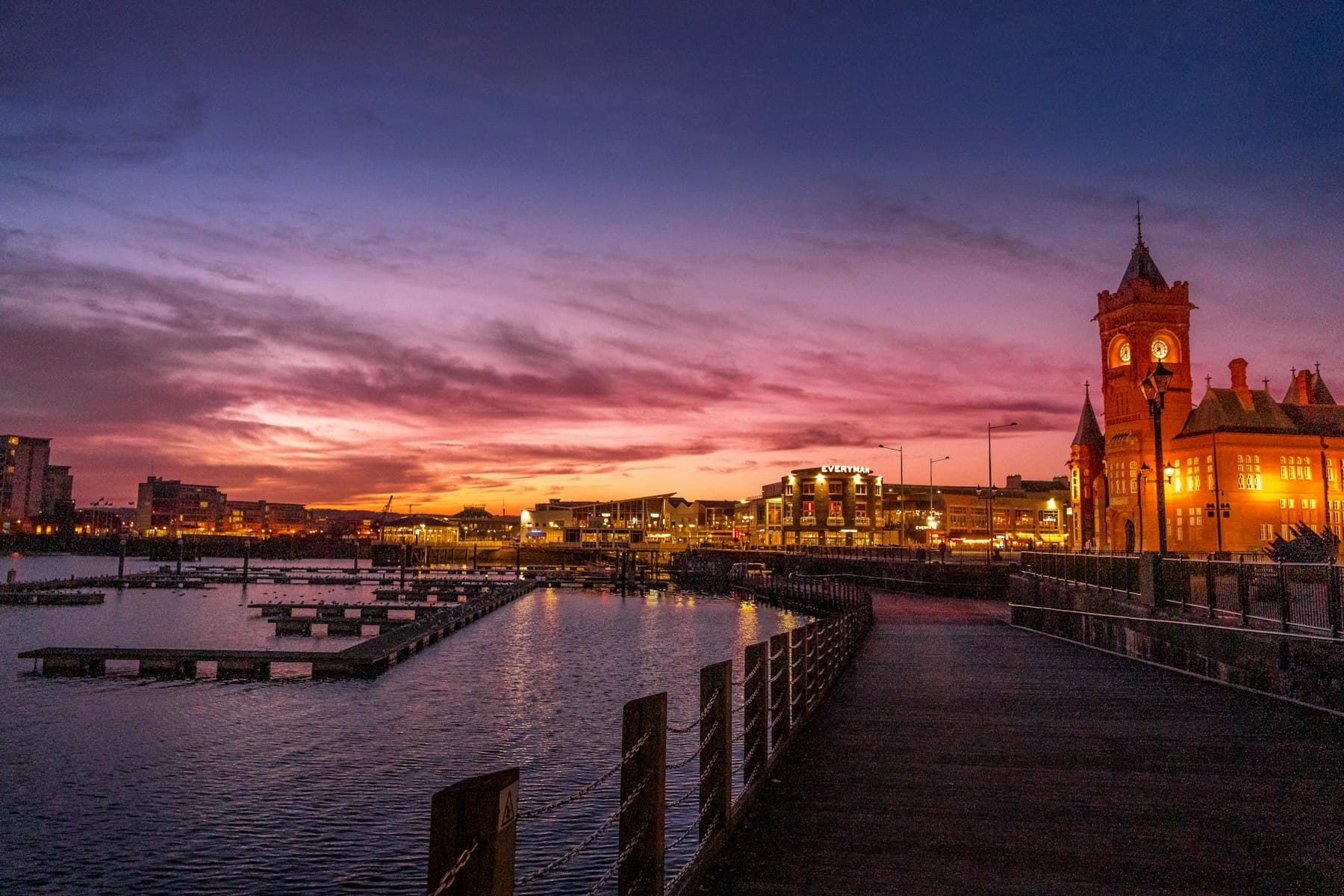 Cardiff Bay at sunset, looking across the water to the waterfront