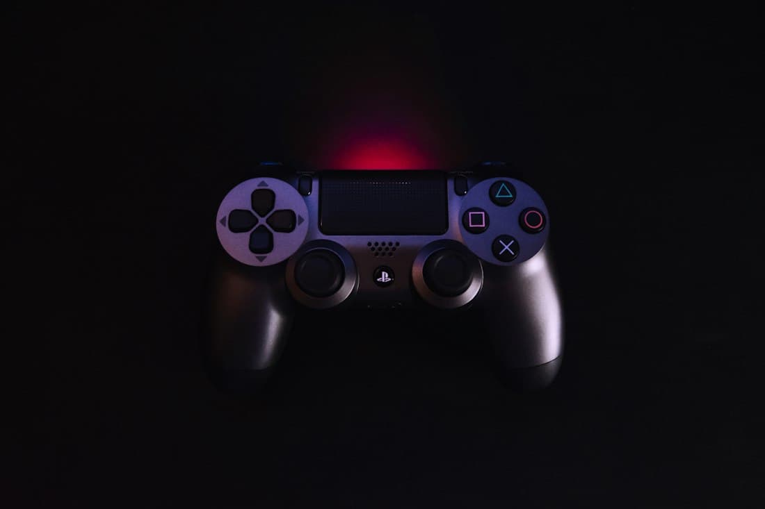 A games controller on a dark surface
